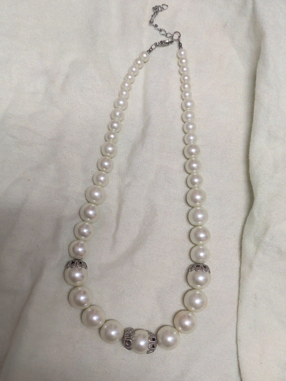Elegant White Pearl Necklace with Silver Accents